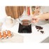 Black glass digital kitchen scale with LCD display, angled front view