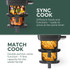 Two black dual air fryers with wood accents on kitchen worktop