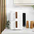 White dual air fryer with wood-effect handles on kitchen counter, lifestyle setting