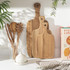 Set of three rectangular wooden chopping boards with handles, branded Salter.