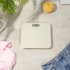Cream Salter battery-free electronic bathroom scale in box, powered by kinetics