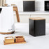 White electric kettle with wood effect handle on kitchen worktop, Salter branding visible