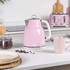 Pink electric kettle with handle, Salter brand, on kitchen counter