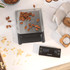 Digital kitchen scale with almonds on platform and touchscreen display, food prep setting