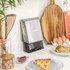 Salter digital kitchen scale with stainless steel finish on worktop