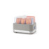 Taupe Salter electric egg cooker with clear lid, shown with six eggs inside.