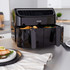Salter black dual basket air fryer on kitchen counter, with cooked food ready to serve.