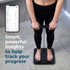 Black smart bathroom scale showing app data, used to track progress.