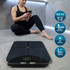 Black digital bathroom scale on floor, fitness setting, shows goal setting and body metrics