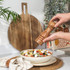 Acacia wood manual pepper mill with Salter logo, angled view