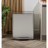 Silver pedal bin with flat lid, shown from the front.