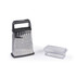 Stainless steel box grater with black handle and clear measuring container.