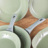 Set of light green Salter frying pans and grill pan with grey handles