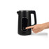 Black electric kettle with digital controls, Salter brand, hand pressing power button