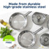 Stainless steel saucepan on hob with tomato sauce, lid and fresh ingredients on worktop
