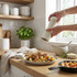White pepper mill grinding over roast chicken and vegetables in a bright kitchen