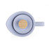 Blue silicone and wood teapot lid viewed from above, showing handle and spout alignment.