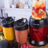 Red Salter blender with NutriPro logo and cups filled with fruit and smoothies.