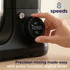 Black stand mixer with metal bowl on kitchen worktop