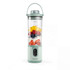 Green portable blender with fresh fruit and yogurt, front view.