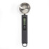 Digital black kitchen spoon scale with LCD display, shown from top view