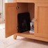 Black bathroom scale stored in wooden cabinet with towels and toiletries