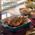 Rectangular dark green ceramic roasting dish with handles, viewed from above