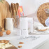 White Salter hand mixer with stand, beaters and dough hooks on kitchen counter