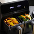 Salter dual basket air fryer with cooked potato wedges and vegetables