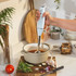Light blue hand blender blending soup in cream pot, kitchen setting, UK product image