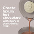 Hot chocolate maker pouring chocolate into a mug with text about dairy or plant-based milk