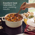 Cream cast iron casserole dish with baked potato topping, shown fresh from oven