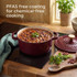 Red cast iron casserole dish with oven gloves, shown with baked potato topping