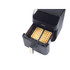 Air fryer drawer with two golden waffles inside, shown from above.