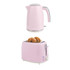 Pink kettle and toaster set. Toaster shown with bagel halves. Ideal for modern kitchens.