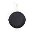 Cream handled cast iron frying pan shown from above