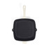 Square black cast iron grill pan with cream handle, shown from above.
