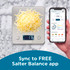 Salter smart kitchen scale with grated cheese and app shown on smartphone