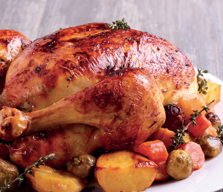 Garlic and Herb Roast Chicken with Roast Potatoes