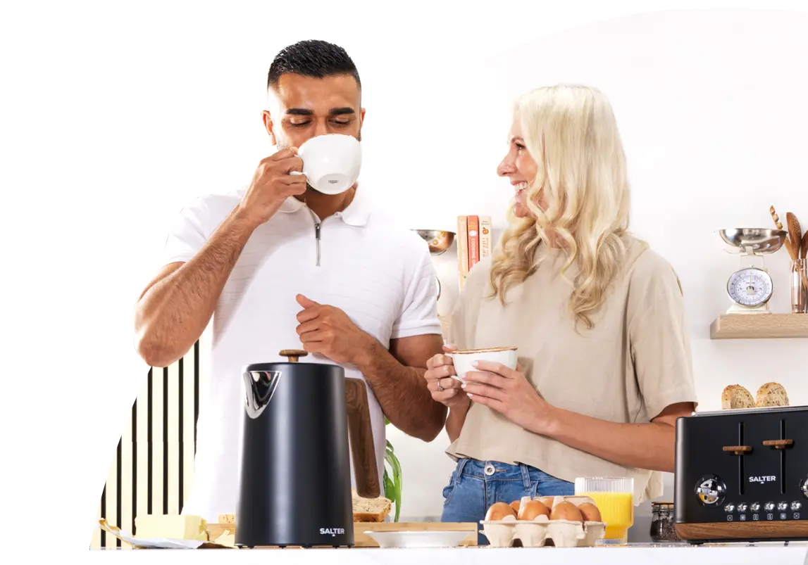 A couple having breakfast with salter products