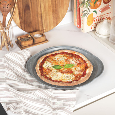 https://cdn11.bigcommerce.com/s-5vfc75n1yv/products/3831/images/41589/marblestone-37-cm-pizza-tray--non-stick-perforated-base-carbon-steel-salter-bw12809eu7-5054061551242__23765.1698462208.386.513.jpg?c=1