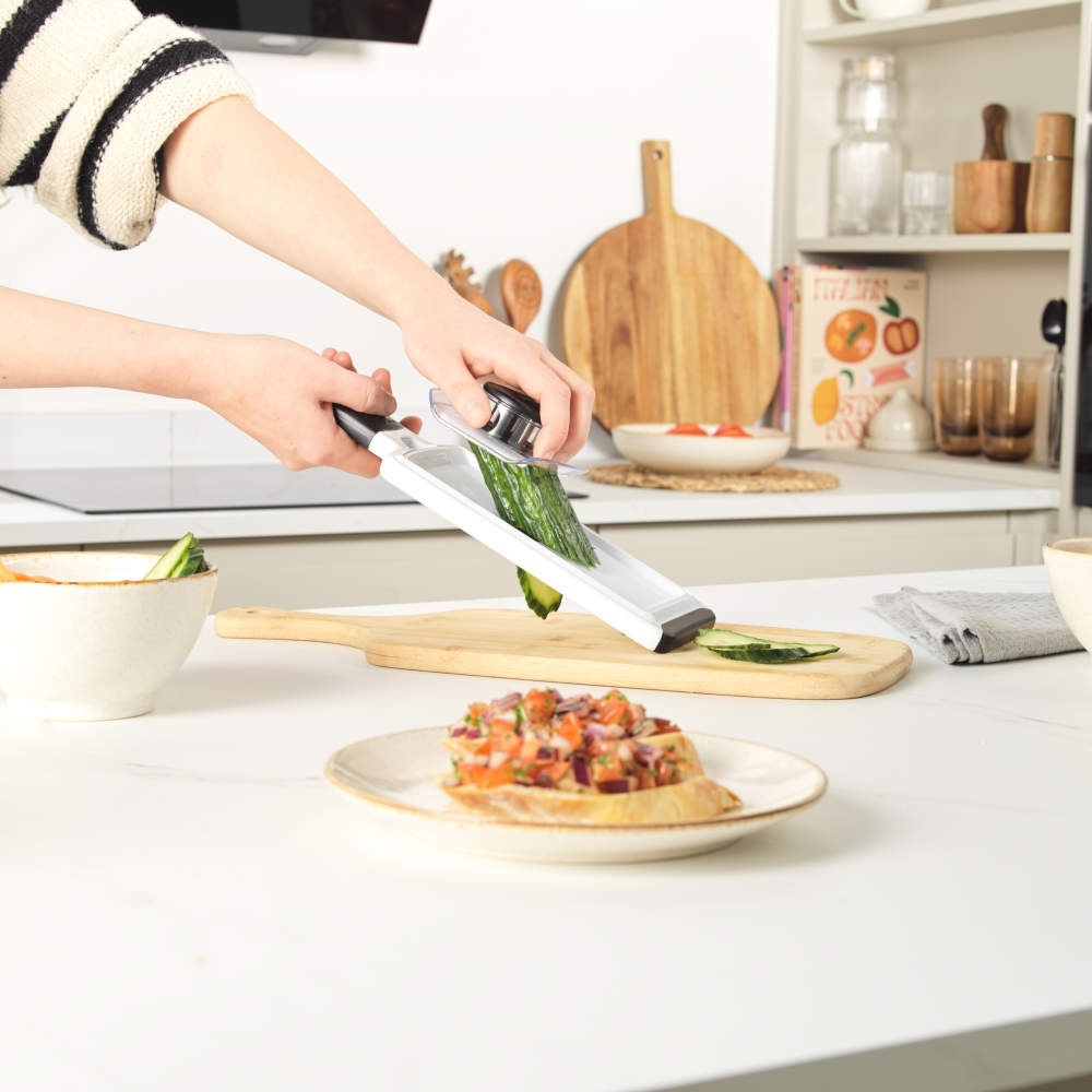 Salter multi-functional grater set with interchangeable blades and a black handle
