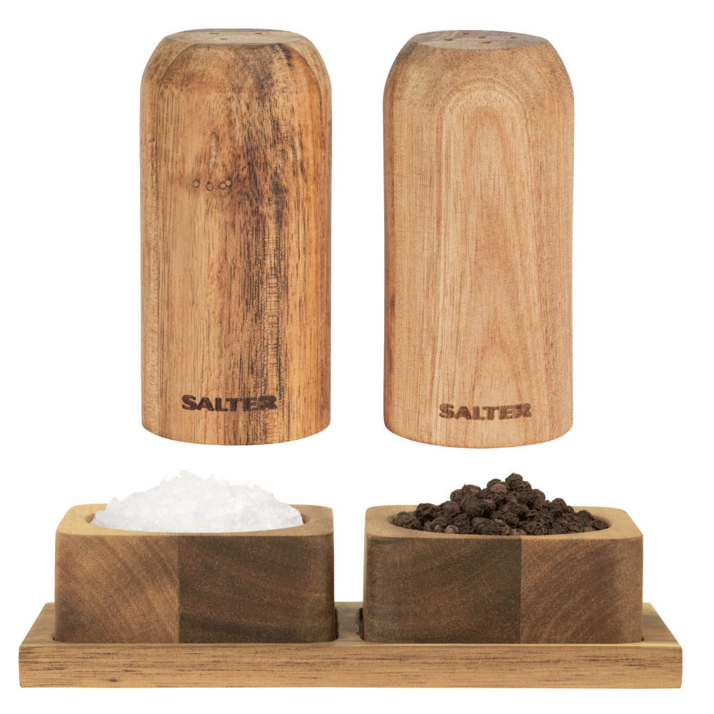 Set of wooden salt and pepper shakers with matching bowls on wooden tray
