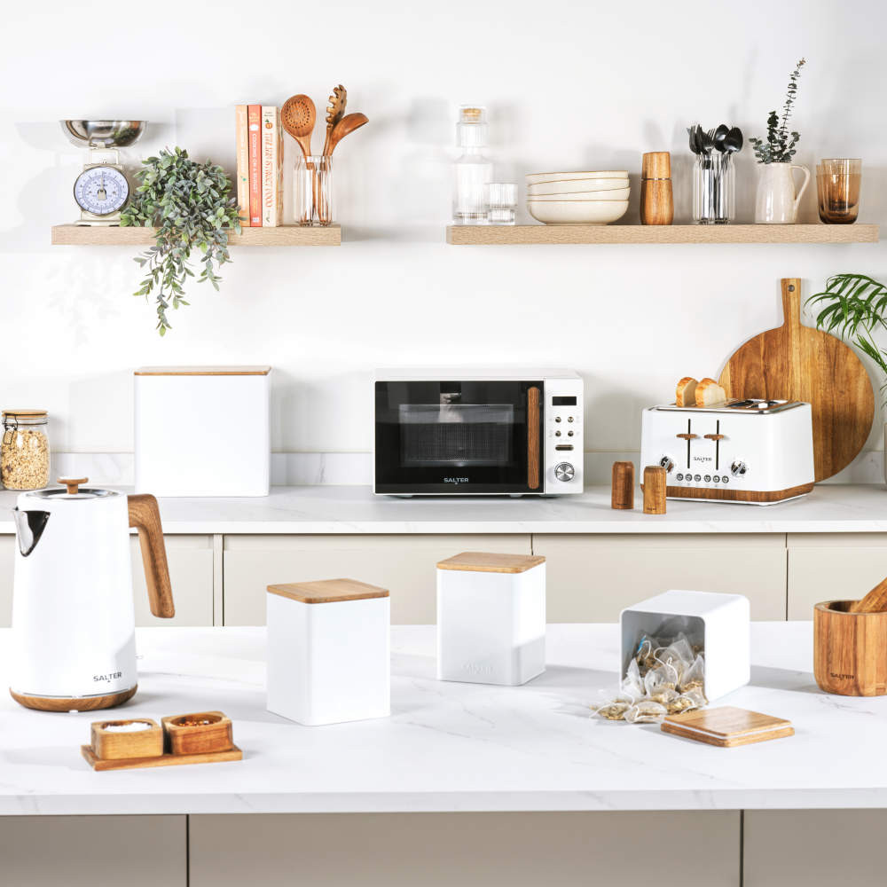 White Salter microwave and toaster with wood accents on kitchen counter, two slices of toast