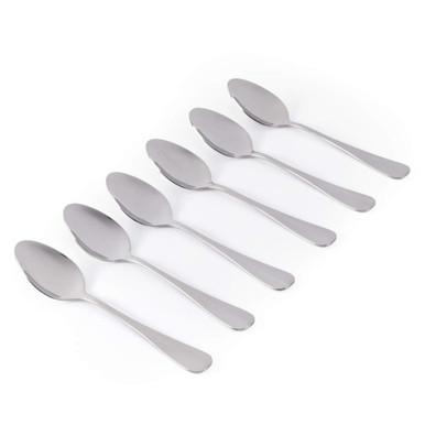 Set of six silver stainless steel dessert spoons on white background