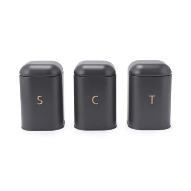 Set of three matte black storage tins labelled S, C, and T for tea, coffee, and sugar.