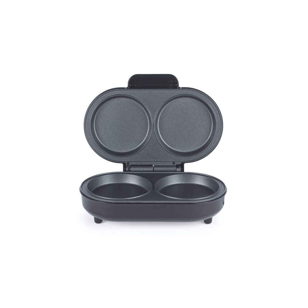 Black electric egg cooker with two round non-stick compartments, open and empty, front view