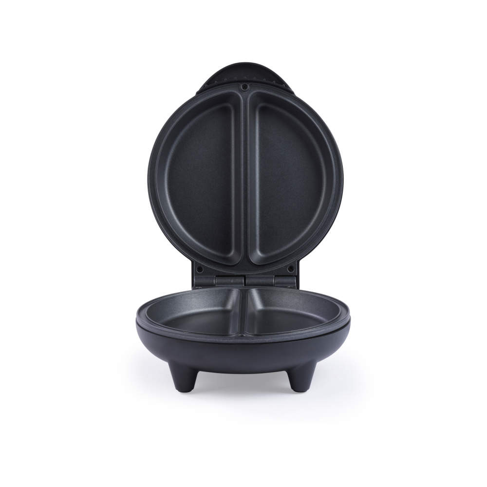 Black electric omelette maker, open, showing two non-stick cooking sections