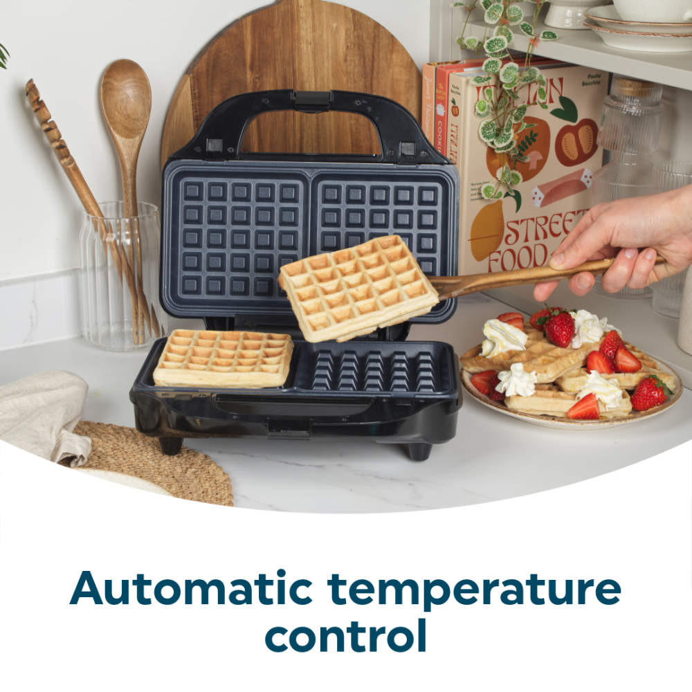 Black waffle maker with waffles and text: Automatic temperature control