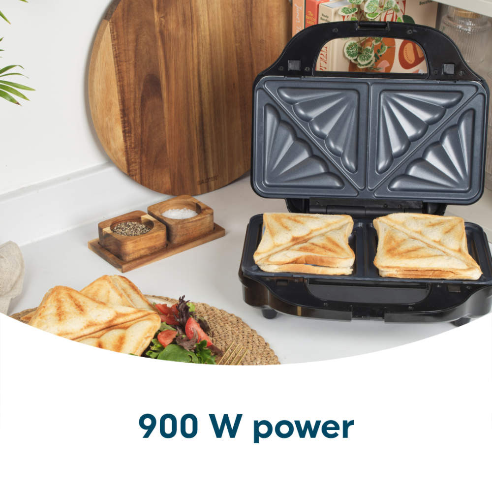 Black sandwich toaster with two toasted sandwiches, 900W power